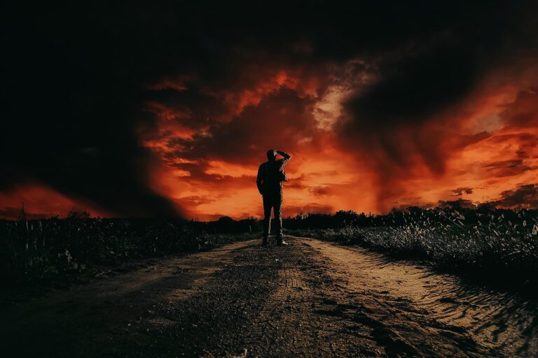 Dark Stranger Things–style scene with a lone figure facing a red stormy sky symbolizing danger and mystery
